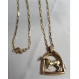 A marked 9.375 gold horse pendant, length including bale 2.5cm, with a marked 375 fine box link