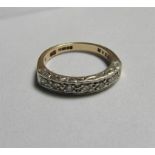 A marked 375 gold, diamond and platinum half eternity band ring. Ring size P, weight 3.6g