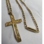 A Birmingham hallmarked 9ct gold crucifix with foliate engraved pattern to the front, length 3.8cm