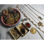 A tagged 375 gold trace link necklace, weight 2g, together with a large collection of costume