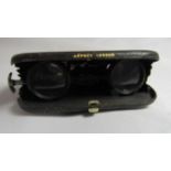 Asprey - A vintage purse cased pair of opera glasses, marked Asprey London