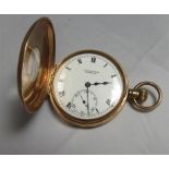 A 9ct gold cased half hunter pocket watch marked 9.375 to the inner case, case diameter 4.9cm. Gross