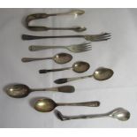 A pair of silver, hallmarked sugar tongs together with five silver teaspoons, a white metal tea