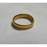 A 22 carat gold band ring, hallmarked for Birmingham, ring size L, weight 3.5g