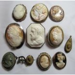 A collection of 11 early 20th century cameos to include white, grey and black hardstone.