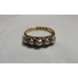 An 18ct gold pearl dress ring, hallmarked for Birmingham 1887, ring size N, weight 3.7g - formerly