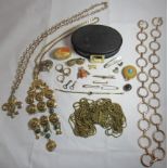 A collection of vintage and modern costume jewellery.