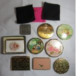 Seven vintage Stratton mirror compacts, some with puff/grill and pouch, together with two Stratton