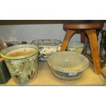 A pine three legged milking stool together with a Poole bowl and other ceramics including two