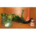 A green glass cornucopia, a green glass porron, green lead glass vase and other items