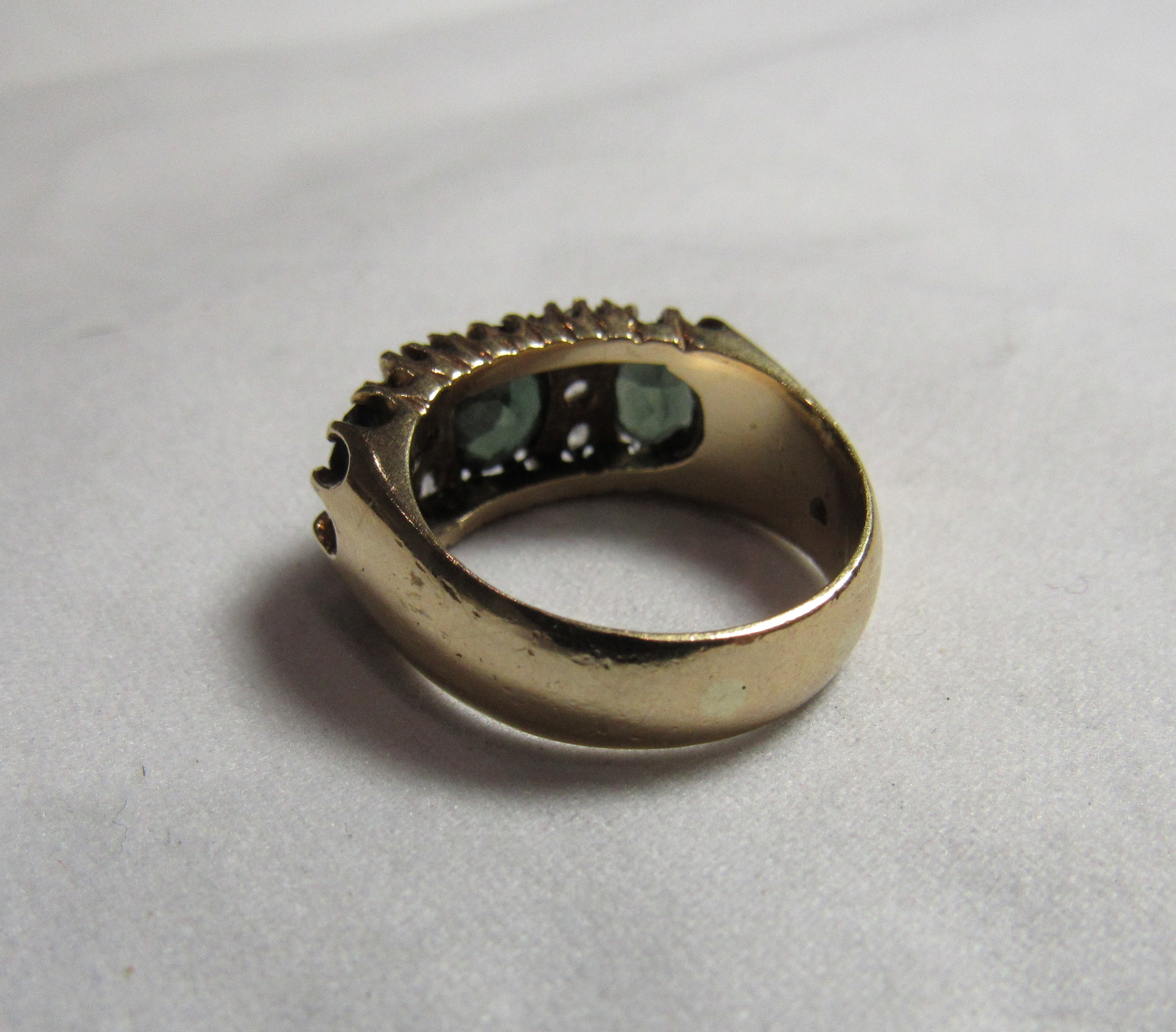 A 9ct gold green and white stone dress ring with the central oval faceted green stone measuring - Image 2 of 2