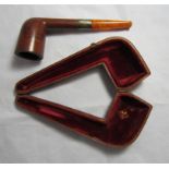 A Victorian cased pipe with amber tip and a central silver band. Hallmarked for Birmingham 1897.
