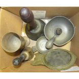 A pewter paraffin holder with central wick, two hand bells, silver plated goblet etc.