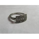 An art deco/retro Platinum and diamond horizontally set panel ring with 18 round cut diamonds each