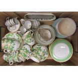 Green, gilt and white Crown Staffordshire teacups, saucers, plates, cake plates together with