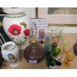 Two Portmeirion vases, a collection of small coloured glasses and coloured brass vase