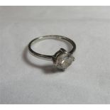 A white gold and CZ solitaire ring with the round cut cubic zirconia measuring approx. 6mm in