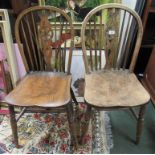 A Windsor small chair with formed seat on turned legs united by H stretchers together with another
