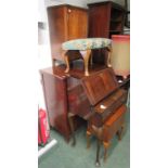 A two door music cabinet, a writing bureau, a side cabinet, an upholstered stool and a lidded box