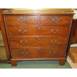 A mahogany chest of drawers with two short and three long drawers and with drop handles (AF)