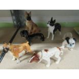 Six ceramic dogs