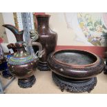 Three black and copper matching cloisonne pieces, a jug with coloured decoration and a dragon