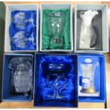 Six boxed Irish crystal glass, a Tipperary Vase, a Duiske blue bowl on clear wavy stem, a