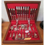 A silver plated canteen of cutlery and five bone handled tea knives