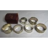 A collection of eight silver napkin rings. Weight 187.4g.