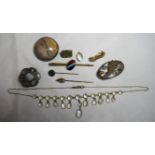 A collection of mostly early 20th century jewellery to include a small memorial brooch containing