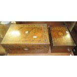 A wooden inlaid writing box with internal slope and inlaid mother of pearl decoration to lid with