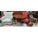 Two brass paraffin lamps with glass funnels, a green bedroom armchair, a pink button back bedroom