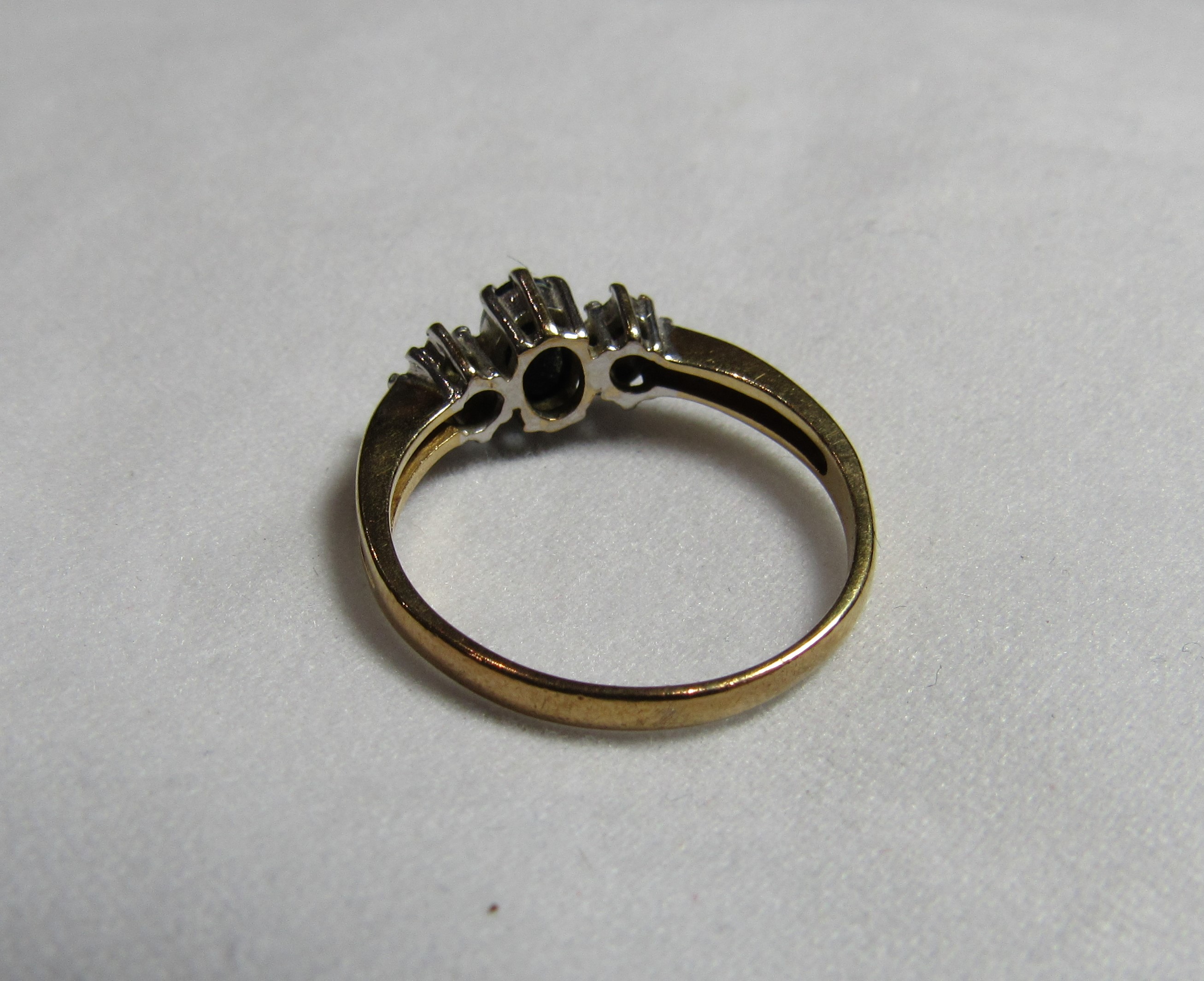 A 9ct gold, sapphire and diamond accent dress ring with faded markings. Ring size O, weight 2.3g. - Image 2 of 2