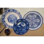 Three blue and white display plates, one Minton and two Wedgwood together with a small dark blue