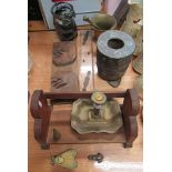 A brass candle holder, brass fly and miniature frog knocker, two wooden book racks, glass vase etc.