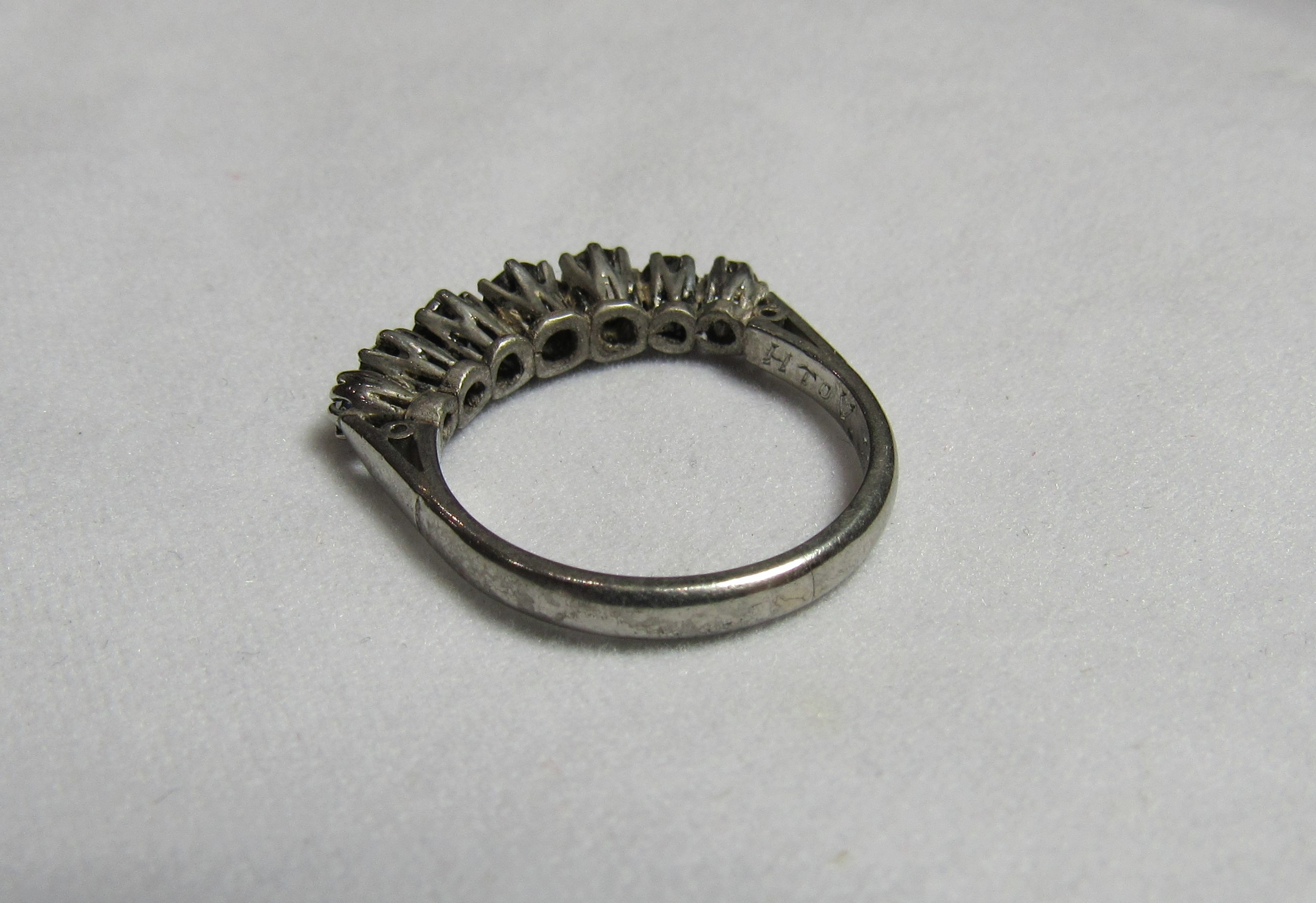 A vintage platinum and graduated seven stone diamond dress ring, marked Plat and inscripted 22/12/51 - Image 2 of 3
