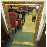 A large gilt framed mirror, 65cm x 100cm approx.