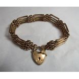 A 9ct gold heart padlock four gate bracelet, weight 16g.