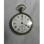 A white metal Waltham USA open faced pocket watch measuring 5cm in diameter. In working condition