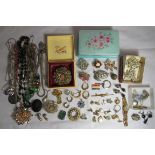 A collection of Victorian and later costume jewellery to include a Jet type high raised relief cameo