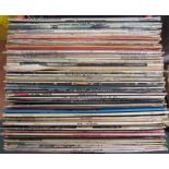 A large collection of LP's to include The Beatles, Frank Sinatra and Dionne Warrick etc.
