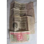 Three 1923 10000 Mark bank notes together with a sweepstake ticket 1934.