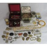 A large collection of mostly vintage costume jewellery to include a silver crucifix hand painted