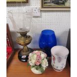 A paraffin lamp with etched glass shade and glass funnel together with a Bristol blue large goblet