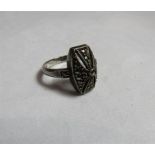 An art deco silver and marcasite panel ring with the panel measuring 15mm x 8mm approx. ring size