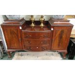 A mahogany sideboard with bow drawers to middle with drop handles (1 drop missing) and with a