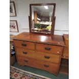 A golden pine dressing table with two long and two short drawers and with swing mirror and drop