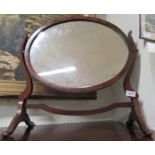 A mahogany dressing table swing mirror