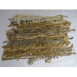 A large collection of mostly gold tone costume jewellery.