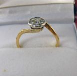 DIAMOND SET CLUSTER RING MARKED 18CT Condition Report: Weight: 2g.